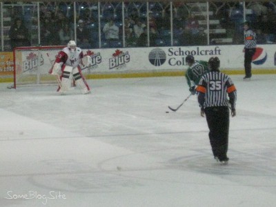 picture of a hockey shootout in action