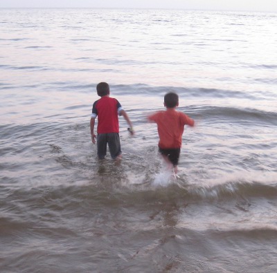 photo of children in Lake Michigan beach at Maranatha