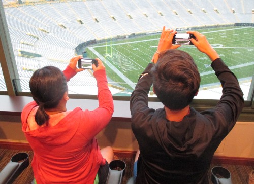 image of tourists taking a photo at Lambeau Field in Green Bay